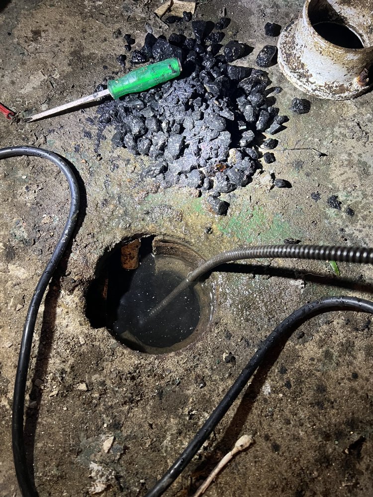 Slide of Dan's Drain Services