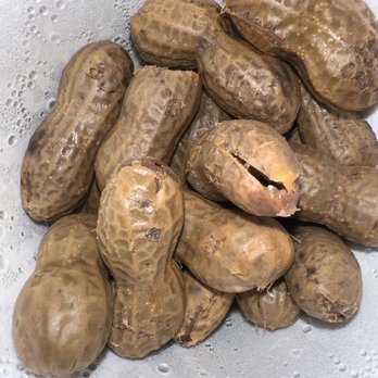 Merritt Pecan - a pile of peanuts in a colander - Specialty Food Near Me - Weston, Georgia Merritt Pecan - a pile of peanuts in a colander - Specialty Food Near Me - Weston, Georgia