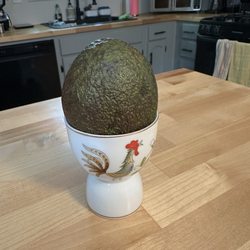 Egg cup with avocado.
