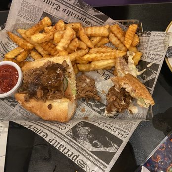 Garden District - Couldn't finish the po' boy. Hubby said it tasted like cat food. - Cajun/Creole Near Me - Grand Rapids, Michigan