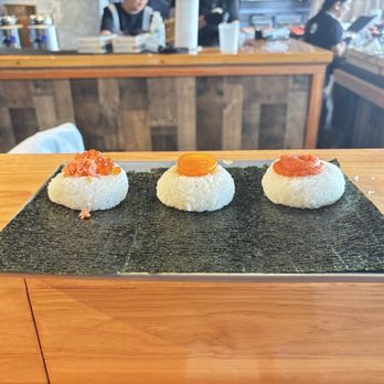 Onigiri Onibe - Salmon ikura, seasoned egg yolk, and spicy mentaiko - Japanese Near Me - Honolulu, Hawaii