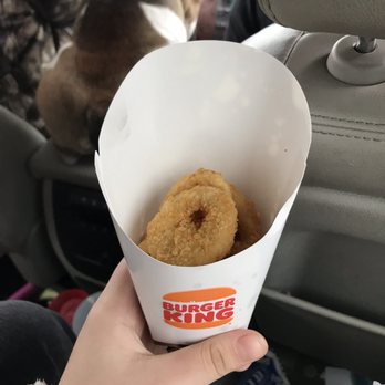 Burger King - a person holding a box of donuts - Burgers Near Me - Bonham, Texas
