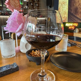 Brasas Peru - Red wine comes with Lomo Saltado (weekend delights menu) - Peruvian Near Me - Franklin Square, New York Brasas Peru - Red wine comes with Lomo Saltado (weekend delights menu) - Peruvian Near Me - Franklin Square, New York
