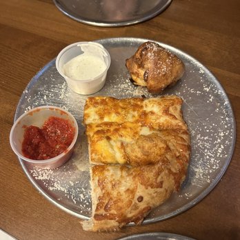 Caliente Pizza and Draft House - The end of the cheesy bread Ana's buffalo chicken rolls - Pizza Near Me - Sewickley, Pennsylvania