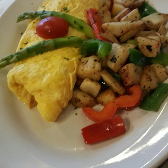 Belgian Waffle Boutique - Omelette with manchego cheese - Cafeteria Near Me - Cancún, ROO Belgian Waffle Boutique - Omelette with manchego cheese - Cafeteria Near Me - Cancún, ROO