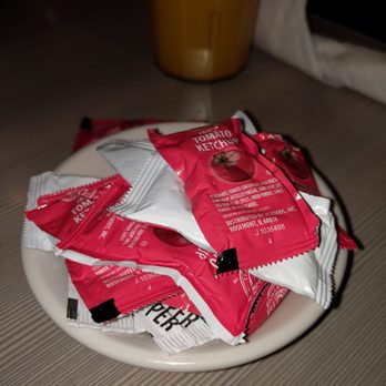 Perkins Restaurant & Bakery - a plate of coffee packets - Bakeries Near Me - Northfield, Minnesota Perkins Restaurant & Bakery - a plate of coffee packets - Bakeries Near Me - Northfield, Minnesota