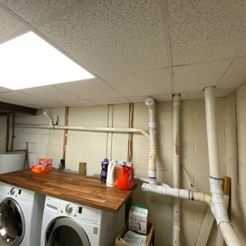 Adamark Home Improvements - Full room view with finished drop ceiling - Security Systems Near Me Adamark Home Improvements - Full room view with finished drop ceiling - Security Systems Near Me