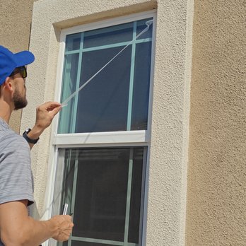 Hatton Window Cleaning  - Removing excess turf protection film - Home Window Tinting Near Me - Davenport, Florida