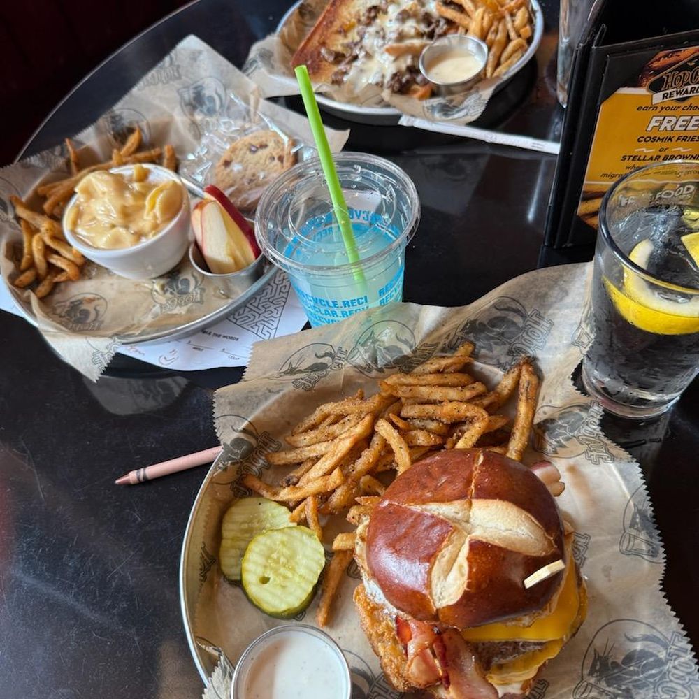 Kids Mac and fries w/ apple wedges, cheese steak sandwich with fries and cheese sauce and bacon cheeseburger w/ fries.