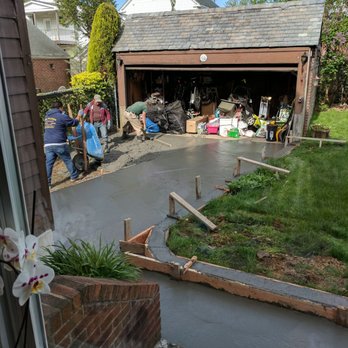 Phil Valenza Contracting - a view of a garage from a window - General Contractors Near Me - Whitestone, New York Phil Valenza Contracting - a view of a garage from a window - General Contractors Near Me - Whitestone, New York