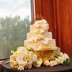 I Do Wedding Cakes - Our wonderful wedding cake. We provided our own florals. The cake and stand is from I Do Wedding Cakes.