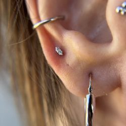 14k White gold used in a high lobe piercing