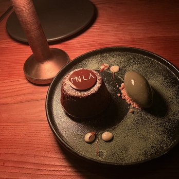 MILA Restaurant - molten chocolate lava cake, yuzu caramel, almond crumble, matcha ice cream - Mediterranean Near Me - Miami Beach, Florida MILA Restaurant - molten chocolate lava cake, yuzu caramel, almond crumble, matcha ice cream - Mediterranean Near Me - Miami Beach, Florida