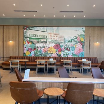 Starbucks - a coffee shop with tables and chairs - Coffee & Tea Near Me - Richmond, Virginia