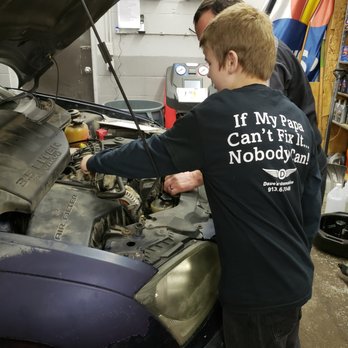 Dave's Automotive - Michael helping his Grandpa while wearing his favorite shirt. - Auto Repair Near Me - Leavenworth, Kansas Dave's Automotive - Michael helping his Grandpa while wearing his favorite shirt. - Auto Repair Near Me - Leavenworth, Kansas
