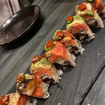 Monkey 68 - a sushi roll on a slate platter - Sushi Bars Near Me - Roswell, Georgia
