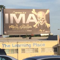 7-Eleven - Disney's Pirates of the Caribbean IMAX advertising in 7-Eleven parking lot