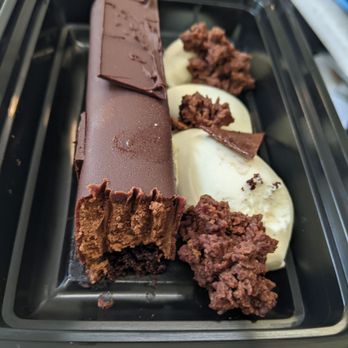 MackBox - Chocolate Expresso mousse cake, side view less one bite - Desserts Near Me
