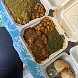 Overstuffed combos: veg korma & ckn vindaloo w/ spinach saag, & chickpea masala, samosas w/ mint & tamarind chutneys.