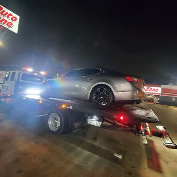 Caribbean Transport and Towing - Vehicle being towed - Towing Near Me - Houston, Texas Caribbean Transport and Towing - Vehicle being towed - Towing Near Me - Houston, Texas