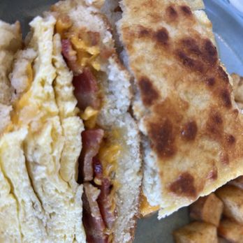 Aura Gardens - The biscuit breakfast sando  cross section - Breakfast & Brunch Near Me - Carlsbad, California