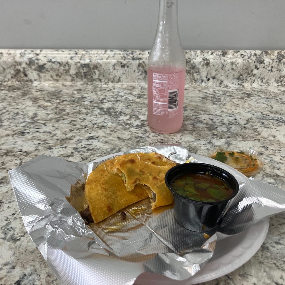 a plate of food and a drink a plate of food and a drink