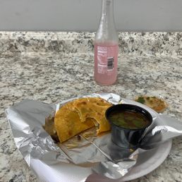 a plate of food and a drink