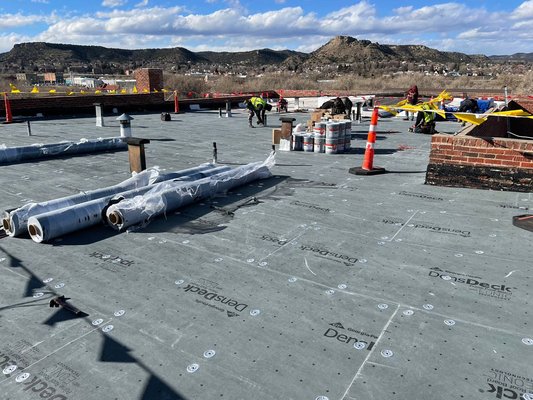 TPO Flat Roof - Replaced an old modified bitumen roof with new TPO membrane. TPO Flat Roof - Replaced an old modified bitumen roof with new TPO membrane.