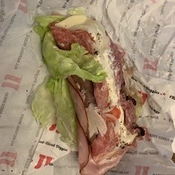 Jimmy John's - I ordered an unwhich and this is what I got. Usually it's fully wrapped in lettuce, not one piece holding the bottom