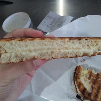 Beecher's Handmade Cheese - Inside view of their grilled cheese sandwich.  A tad small but their cheese it to die for! - Cheese Shops Near Me - Seattle, Washington