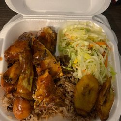Love Bird's Jerk Spot - Jerk Chicken, rice n peas, steamed cabbage.