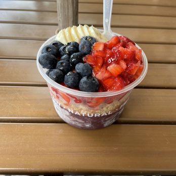 3Natives - a bowl of fruit and yogurt on a wooden table - Acai Bowls Near Me - Port St. Lucie, Florida 3Natives - a bowl of fruit and yogurt on a wooden table - Acai Bowls Near Me - Port St. Lucie, Florida