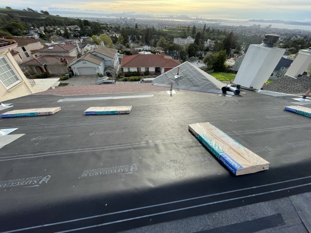 Slide of Bayside Roofing Company