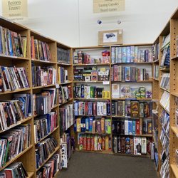 Half Price Books - They have used games that you can buy, plus they have some new stuff as well