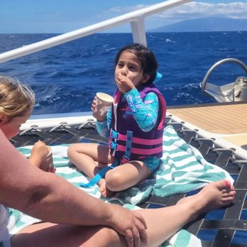 Trilogy Excursions - My daughter enjoying the ice cream, post snorkel. - Snorkeling Near Me - Lahaina, Hawaii