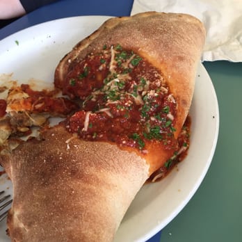 Reginelli's Pizzeria - Calzone - Pizza Near Me - New Orleans, Louisiana Reginelli's Pizzeria - Calzone - Pizza Near Me - New Orleans, Louisiana