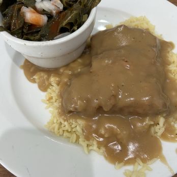 Les Sisters' Southern Kitchen - Lunch portion of smothered chicken with collard greens.  Oh Les Sisters makes their own hot sauce!  It is for sale at the restaurant! - Cajun/Creole Near Me - Winnetka, California