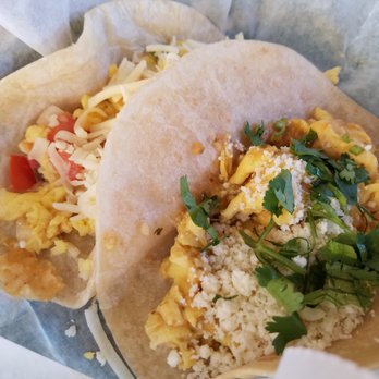 Tacodeli - Left: Migas Tacos. Right: Huevos Ahogados. - Mexican Near Me - Plano, Texas