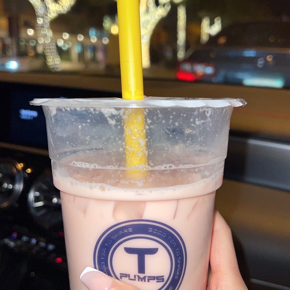 Tpumps - Pasadena - a hand holding a plastic cup of bubble tea - Bubble Tea Near Me - Pasadena, California Tpumps - Pasadena - a hand holding a plastic cup of bubble tea - Bubble Tea Near Me - Pasadena, California