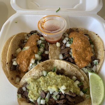 Los de Carnitas - Steak tacos with a side of homemade hot sauce - Food Trucks Near Me - Batavia, Ohio