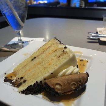 Sharks Underwater Grill - Cannoli cake - New American Near Me - Orlando, Florida Sharks Underwater Grill - Cannoli cake - New American Near Me - Orlando, Florida