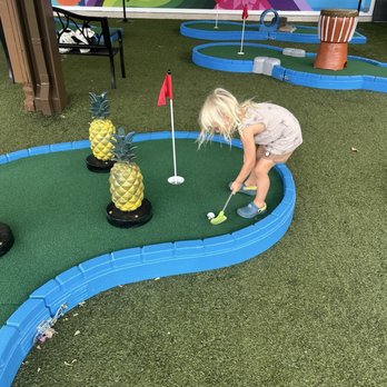 Birdie Time Mini Golf - A boy mini-golfing at a hawaii themed course - Mini Golf Near Me - Honolulu, Hawaii Birdie Time Mini Golf - A boy mini-golfing at a hawaii themed course - Mini Golf Near Me - Honolulu, Hawaii