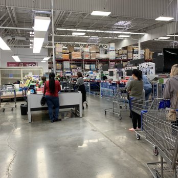 Sam's Club - Customer service line. One rep working and we were asked to get out of the way of the door (because the line was so long). - Wholesale Stores Near Me - Baton Rouge, Louisiana