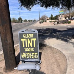 Roadside street sign (north on McQueen).