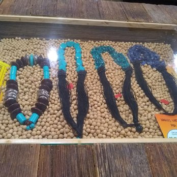 Sula Wok - Their dining tables have glass inserts where they display jewelery that's for sale. - Asian Fusion Near Me - Ottawa, Ontario Sula Wok - Their dining tables have glass inserts where they display jewelery that's for sale. - Asian Fusion Near Me - Ottawa, Ontario