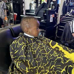 Legacy Sports Barber Shop - He was too cool and did VERY WELL