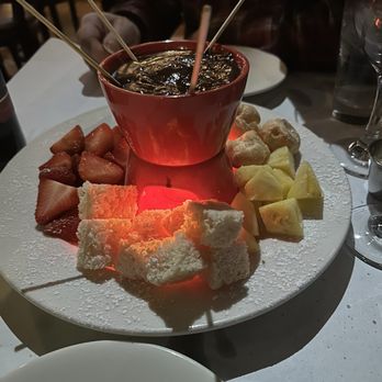 La Dolce Vita - Dark chocolate fondue with strawberries, rice crispy treats, pineapple, cream puffs and marshmallows. - Italian Near Me - Plainfield, Illinois