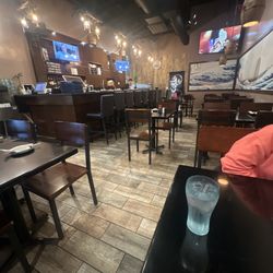 Ronin Sushi & Bar - Only people here and we have to wait 20-25 minutes for a roll.
