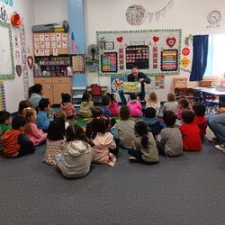 One World Kidz Preschool - The librarian reading to the students during Read Across America in March