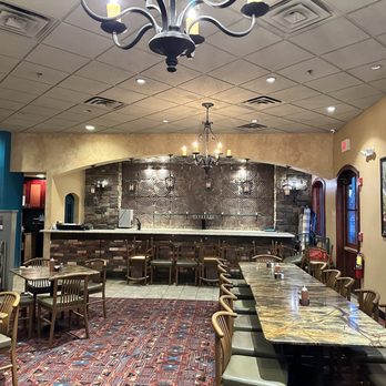 Los Cuates - a dining area with tables and chairs - New Mexican Cuisine Near Me - Albuquerque, New Mexico